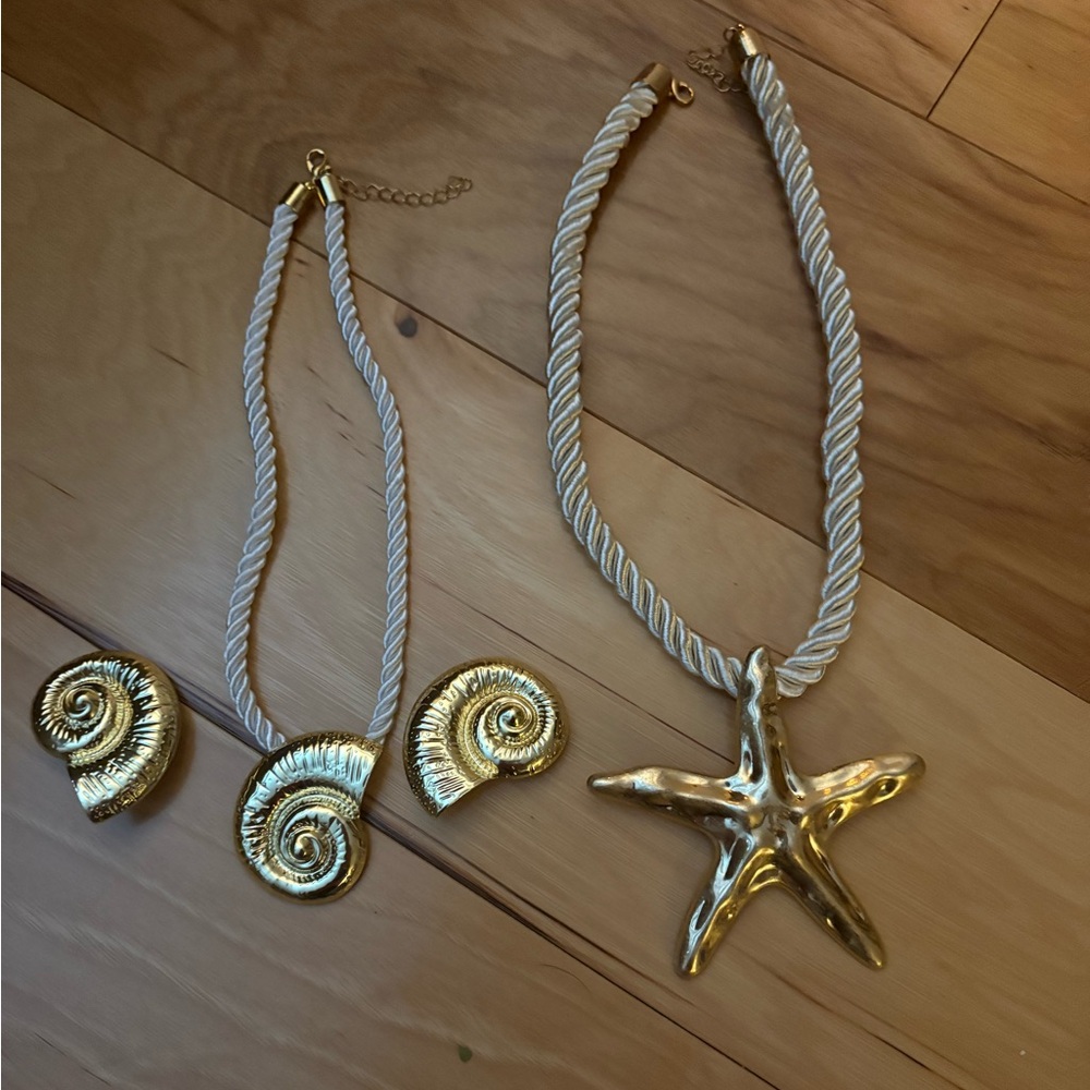 EUC 2 necklaces and a set of earrings